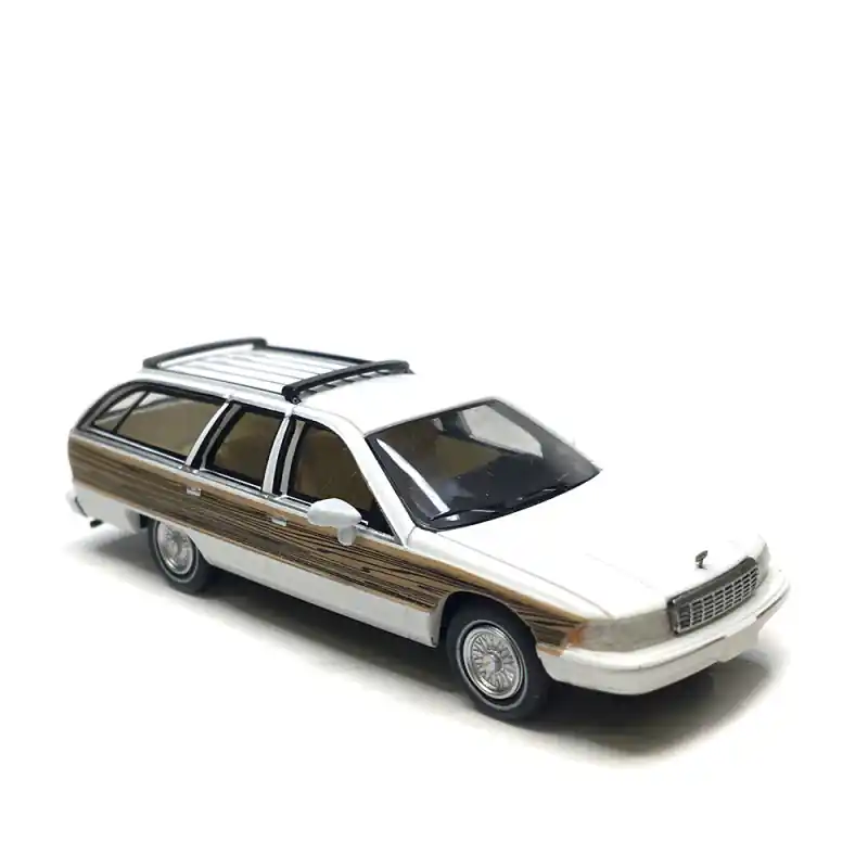 Chevrolet Caprice break, blanc/ décor bois, 1991 - PCX 870453 - HO 1/87 Commander Maintenant